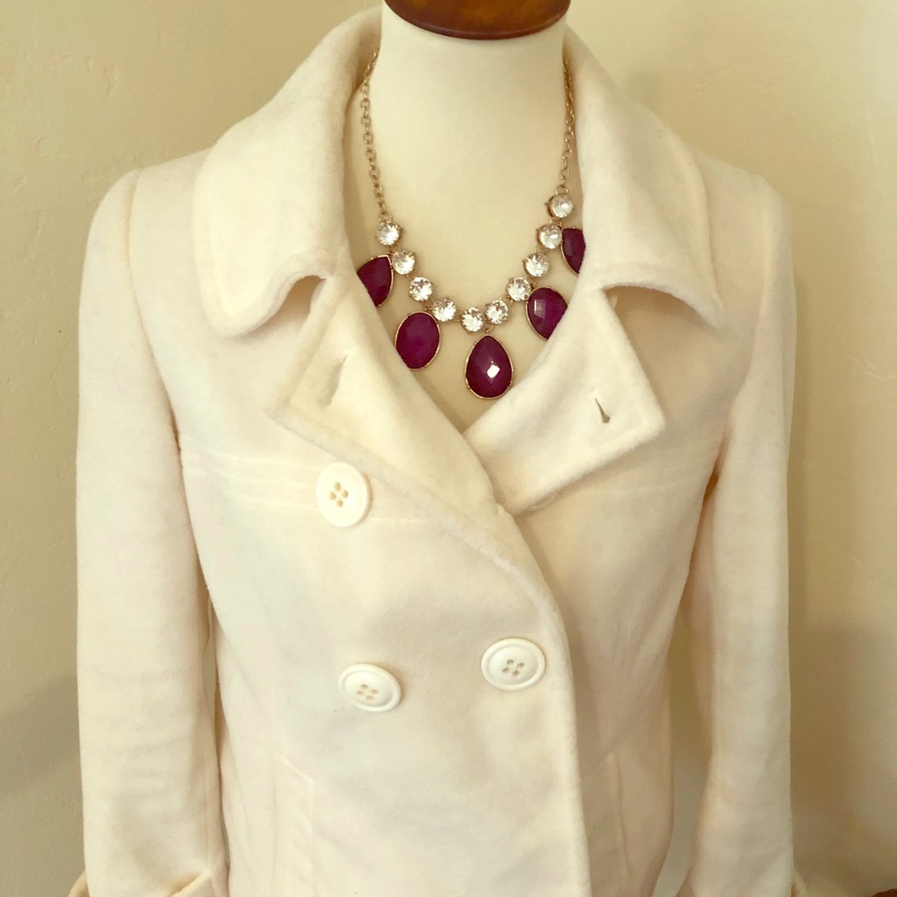 White soft pea coat; the color of the season